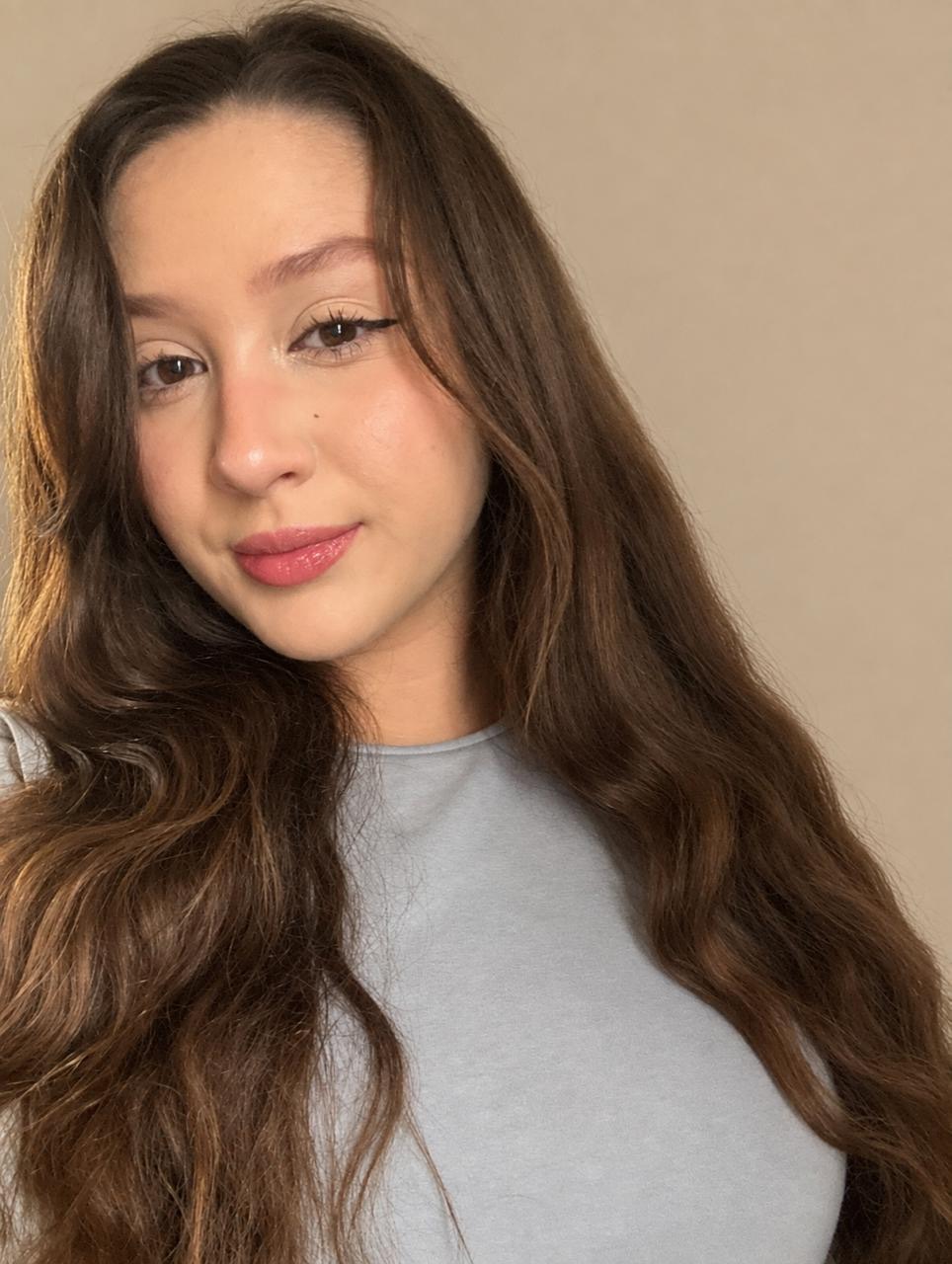 Bella Guevara, certified massage therapist at Theravive Massage